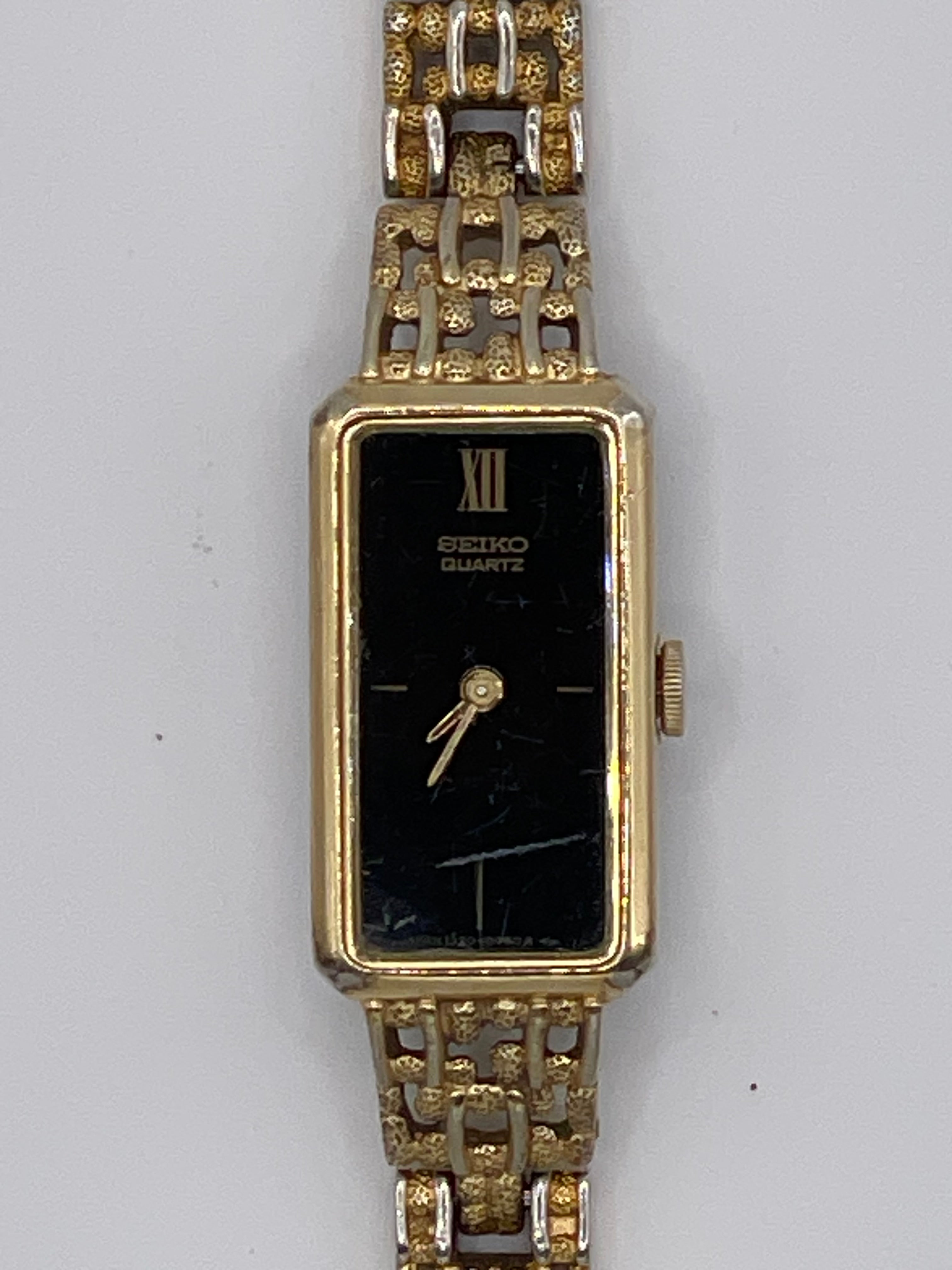 Vintage Seiko Quartz Rectangular Gold-Tone Women’s Watch – Black Dial (Ref. 1320-5249) - Pre-Owned